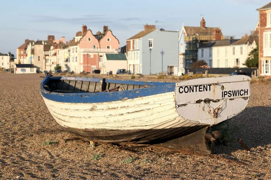 White and blue boat on sea shore, Aldeburgh